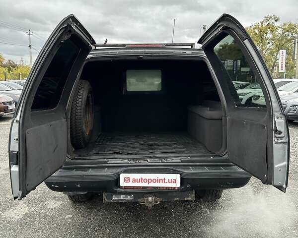 Серый Шевроле Субурбан, объемом двигателя 7.45 л и пробегом 565 тыс. км за 12000 $, фото 14 на Automoto.ua