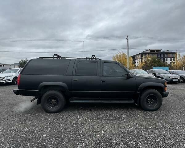 Серый Шевроле Субурбан, объемом двигателя 7.45 л и пробегом 565 тыс. км за 12000 $, фото 4 на Automoto.ua