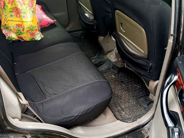 Черный Шевроле Такума, объемом двигателя 2 л и пробегом 100 тыс. км за 1750 $, фото 1 на Automoto.ua