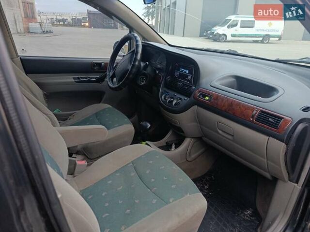Черный Шевроле Такума, объемом двигателя 2 л и пробегом 300 тыс. км за 2450 $, фото 3 на Automoto.ua