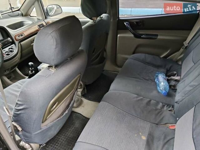 Черный Шевроле Такума, объемом двигателя 2 л и пробегом 191 тыс. км за 2550 $, фото 3 на Automoto.ua