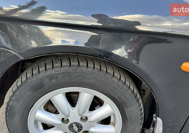 Черный Шевроле Такума, объемом двигателя 2 л и пробегом 95 тыс. км за 4250 $, фото 14 на Automoto.ua