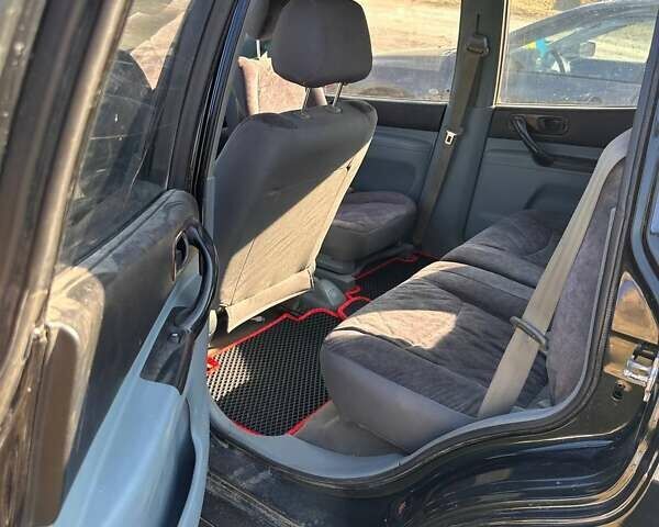 Черный Шевроле Такума, объемом двигателя 2 л и пробегом 350 тыс. км за 2500 $, фото 4 на Automoto.ua