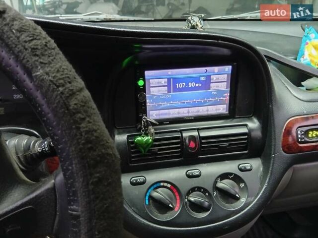 Черный Шевроле Такума, объемом двигателя 1.99 л и пробегом 264 тыс. км за 4000 $, фото 12 на Automoto.ua