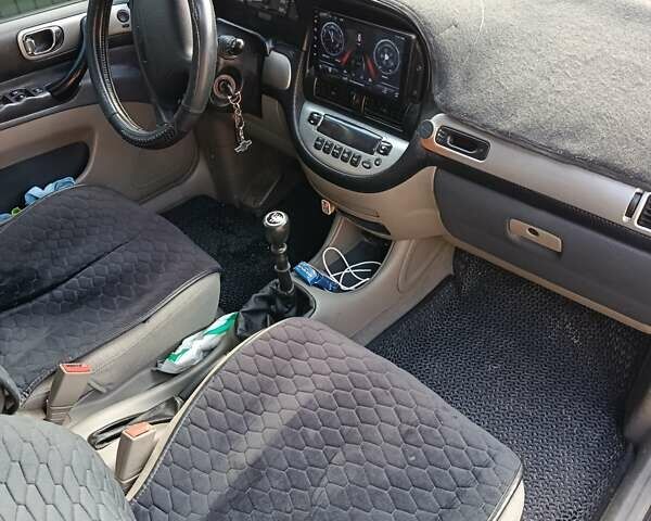 Черный Шевроле Такума, объемом двигателя 2 л и пробегом 310 тыс. км за 3300 $, фото 8 на Automoto.ua