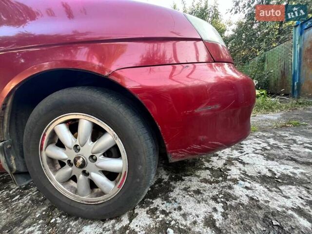 Красный Шевроле Такума, объемом двигателя 2 л и пробегом 375 тыс. км за 2600 $, фото 10 на Automoto.ua