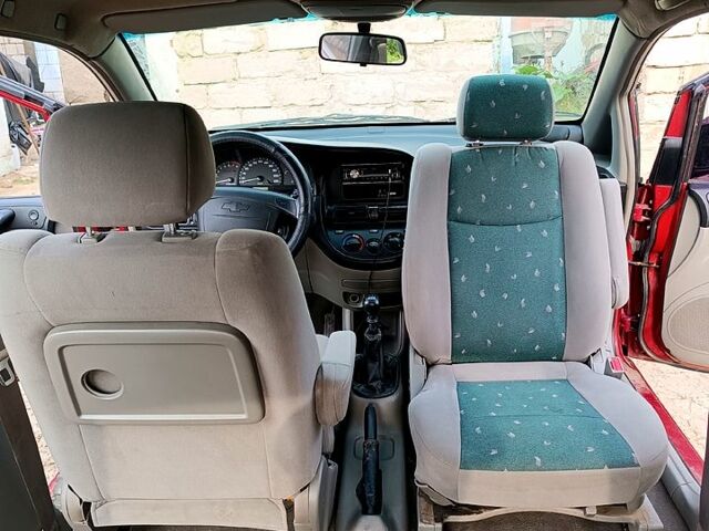 Червоний Шевроле Такума, об'ємом двигуна 2 л та пробігом 212 тис. км за 3650 $, фото 10 на Automoto.ua