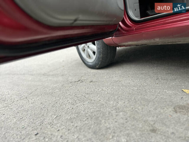 Красный Шевроле Такума, объемом двигателя 2 л и пробегом 300 тыс. км за 3000 $, фото 14 на Automoto.ua