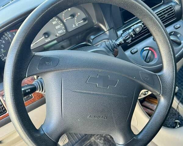 Сірий Шевроле Такума, об'ємом двигуна 2 л та пробігом 150 тис. км за 4200 $, фото 12 на Automoto.ua