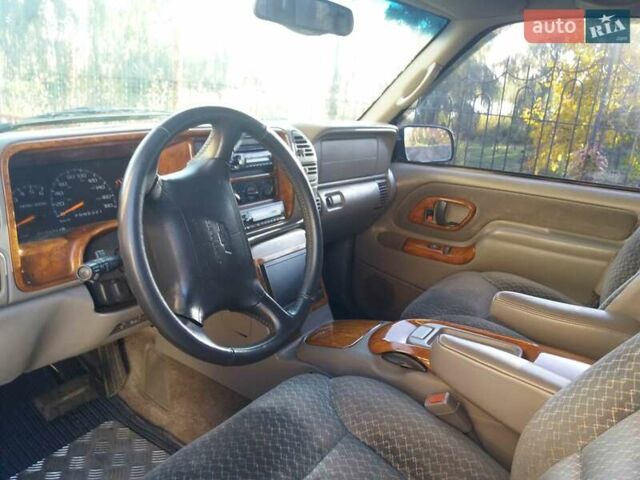 Синий Шевроле Тахо, объемом двигателя 5.7 л и пробегом 250 тыс. км за 13000 $, фото 6 на Automoto.ua