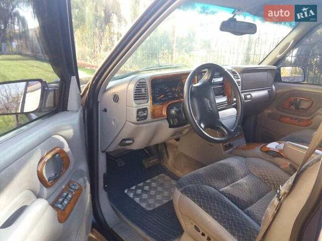 Синий Шевроле Тахо, объемом двигателя 5.7 л и пробегом 250 тыс. км за 13000 $, фото 7 на Automoto.ua