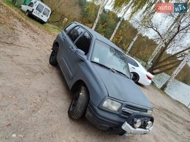 Серый Шевроле Трекер, объемом двигателя 2 л и пробегом 220 тыс. км за 3000 $, фото 4 на Automoto.ua