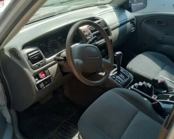 Серый Шевроле Трекер, объемом двигателя 2 л и пробегом 220 тыс. км за 3000 $, фото 10 на Automoto.ua