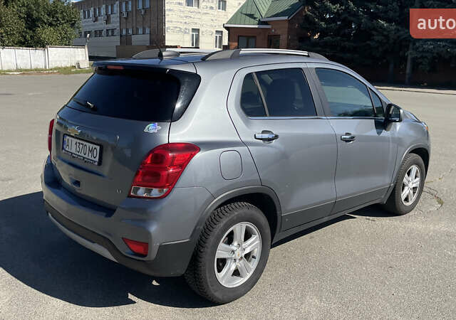 Серый Шевроле Trax, объемом двигателя 1.4 л и пробегом 115 тыс. км за 10000 $, фото 4 на Automoto.ua