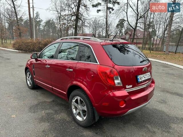 Красный Шевроле Captiva Sport, объемом двигателя 2.38 л и пробегом 238 тыс. км за 8499 $, фото 4 на Automoto.ua