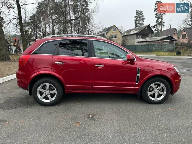 Красный Шевроле Captiva Sport, объемом двигателя 2.38 л и пробегом 238 тыс. км за 8499 $, фото 7 на Automoto.ua