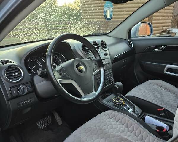 Синий Шевроле Captiva Sport, объемом двигателя 2.38 л и пробегом 190 тыс. км за 10000 $, фото 5 на Automoto.ua
