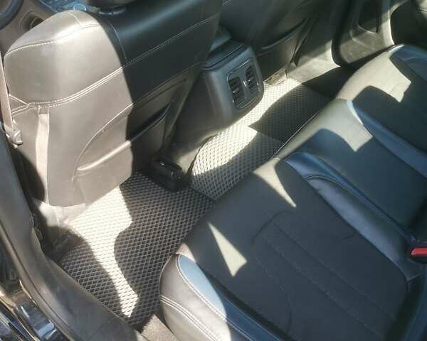 Черный Крайслер 200, объемом двигателя 2.4 л и пробегом 171 тыс. км за 9299 $, фото 2 на Automoto.ua