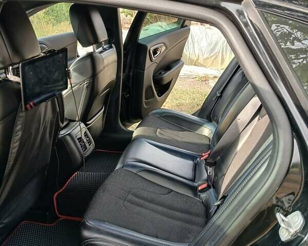 Черный Крайслер 200, объемом двигателя 2.36 л и пробегом 110 тыс. км за 13500 $, фото 16 на Automoto.ua