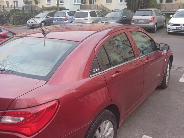 Червоний Крайслер 200, об'ємом двигуна 2.4 л та пробігом 160 тис. км за 6030 $, фото 3 на Automoto.ua