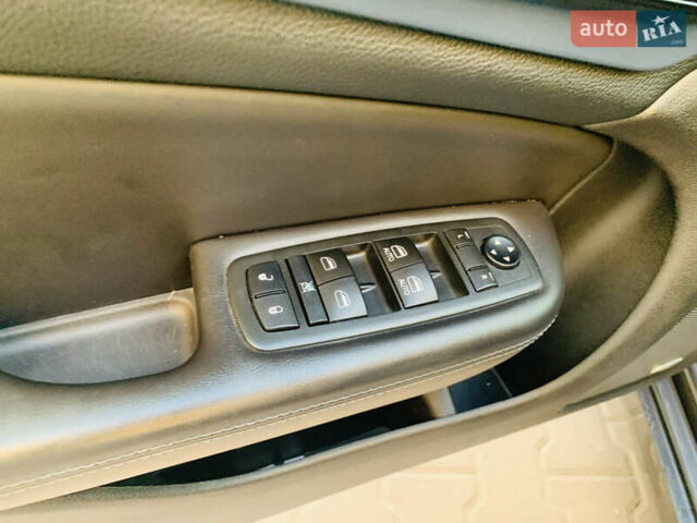 Серый Крайслер 200, объемом двигателя 2.36 л и пробегом 111 тыс. км за 10200 $, фото 44 на Automoto.ua