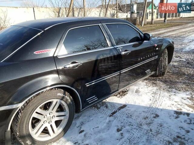 Черный Крайслер 300C, объемом двигателя 2.7 л и пробегом 183 тыс. км за 7500 $, фото 9 на Automoto.ua
