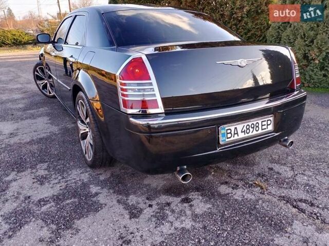 Черный Крайслер 300C, объемом двигателя 3.5 л и пробегом 202 тыс. км за 7593 $, фото 4 на Automoto.ua