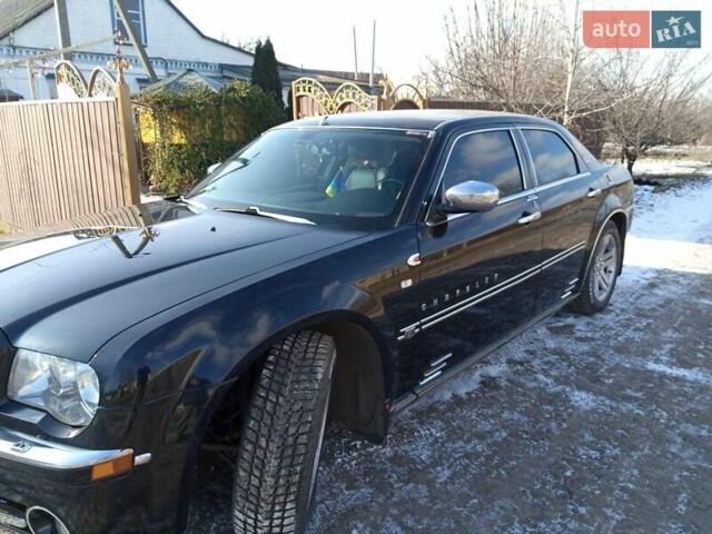 Черный Крайслер 300C, объемом двигателя 2.7 л и пробегом 183 тыс. км за 7500 $, фото 6 на Automoto.ua