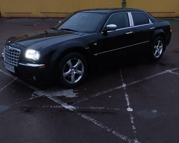 Черный Крайслер 300C, объемом двигателя 2.74 л и пробегом 356 тыс. км за 6500 $, фото 1 на Automoto.ua