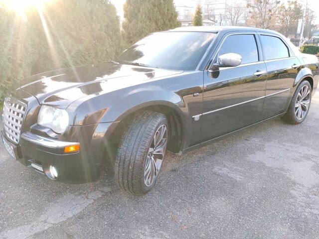 Черный Крайслер 300C, объемом двигателя 3.5 л и пробегом 202 тыс. км за 7593 $, фото 1 на Automoto.ua