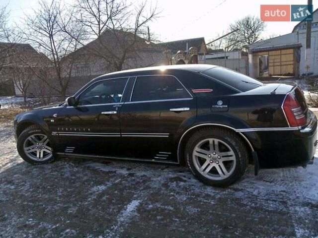 Черный Крайслер 300C, объемом двигателя 2.7 л и пробегом 183 тыс. км за 7500 $, фото 14 на Automoto.ua