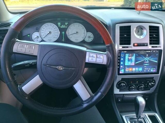 Черный Крайслер 300C, объемом двигателя 3.5 л и пробегом 202 тыс. км за 7593 $, фото 5 на Automoto.ua