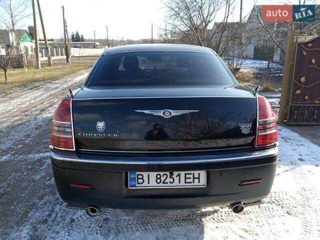 Черный Крайслер 300C, объемом двигателя 2.7 л и пробегом 183 тыс. км за 7500 $, фото 13 на Automoto.ua