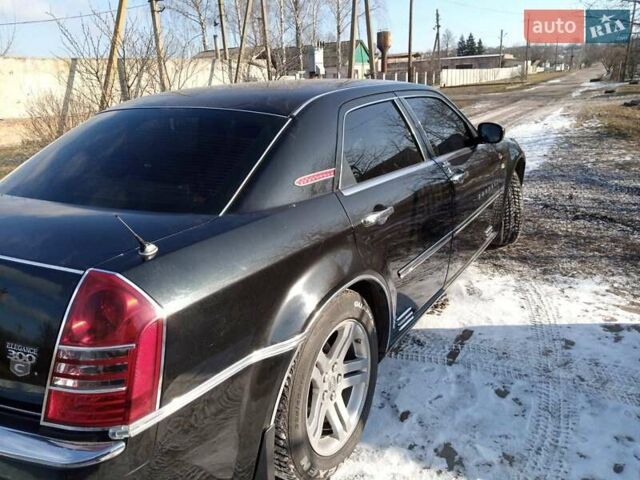 Черный Крайслер 300C, объемом двигателя 2.7 л и пробегом 183 тыс. км за 7500 $, фото 12 на Automoto.ua