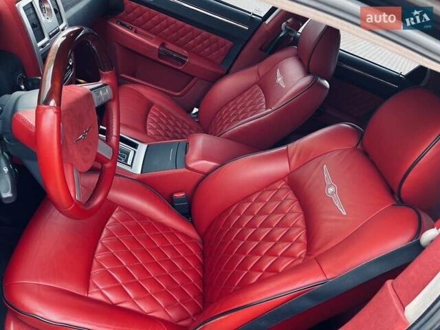 Черный Крайслер 300C, объемом двигателя 5.7 л и пробегом 77 тыс. км за 11500 $, фото 7 на Automoto.ua