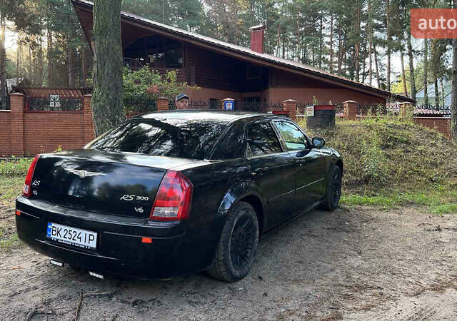 Чорний Крайслер 300C, об'ємом двигуна 2.7 л та пробігом 165 тис. км за 6699 $, фото 3 на Automoto.ua