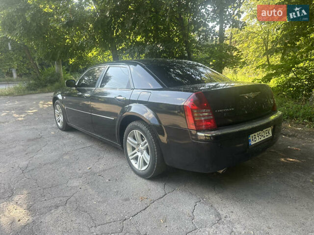Чорний Крайслер 300C, об'ємом двигуна 5.65 л та пробігом 140 тис. км за 9500 $, фото 7 на Automoto.ua
