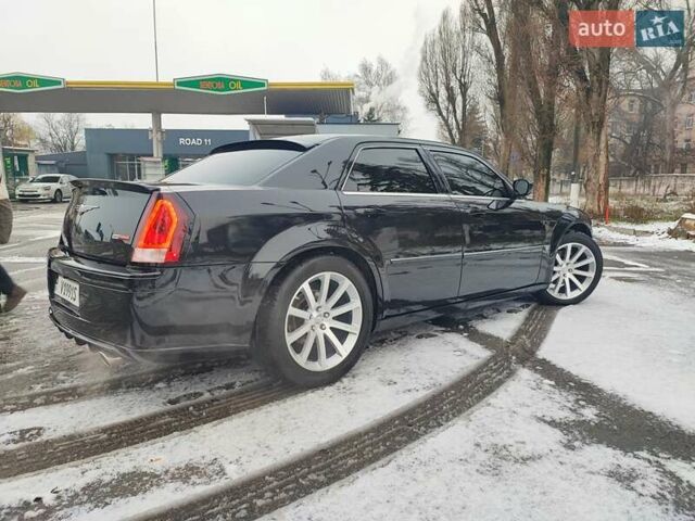Черный Крайслер 300C, объемом двигателя 2.74 л и пробегом 220 тыс. км за 10500 $, фото 5 на Automoto.ua