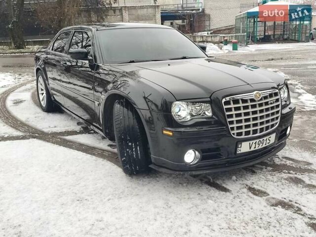 Черный Крайслер 300C, объемом двигателя 2.74 л и пробегом 220 тыс. км за 10500 $, фото 11 на Automoto.ua