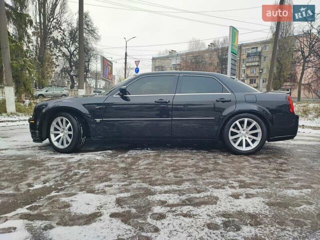 Черный Крайслер 300C, объемом двигателя 2.74 л и пробегом 220 тыс. км за 10500 $, фото 7 на Automoto.ua
