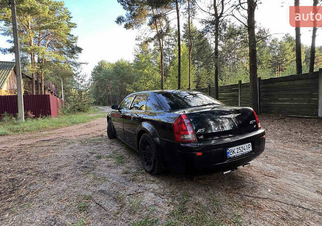 Чорний Крайслер 300C, об'ємом двигуна 2.7 л та пробігом 165 тис. км за 6699 $, фото 14 на Automoto.ua