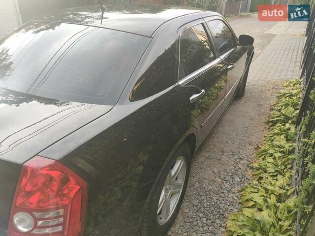 Черный Крайслер 300C, объемом двигателя 3.5 л и пробегом 271 тыс. км за 8990 $, фото 6 на Automoto.ua