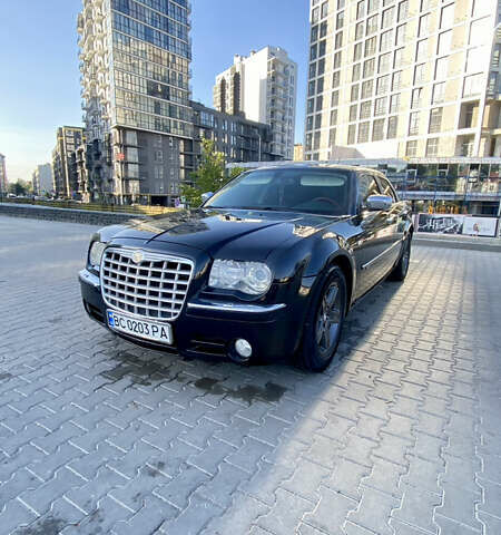 Черный Крайслер 300C, объемом двигателя 3.5 л и пробегом 251 тыс. км за 8800 $, фото 1 на Automoto.ua