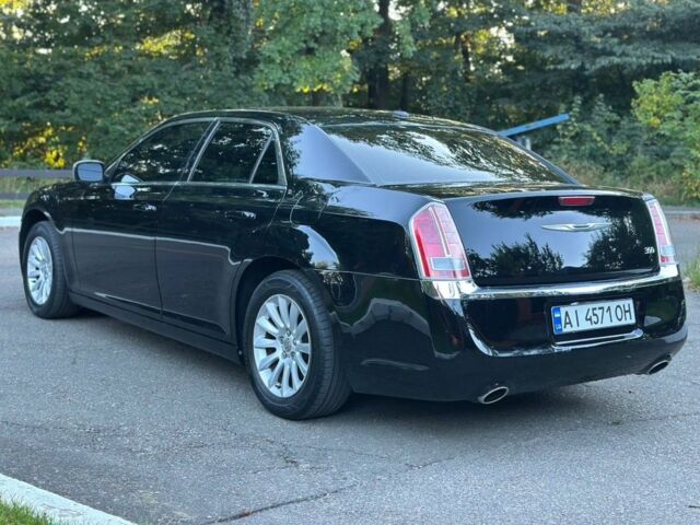 Крайслер 300C 2012 у Києві на Automoto.ua Чорний Крайслер 300C, об'ємом двигуна 3.6 л та пробігом 215 тис. км за 10900 $, фото 4 на Automoto.ua