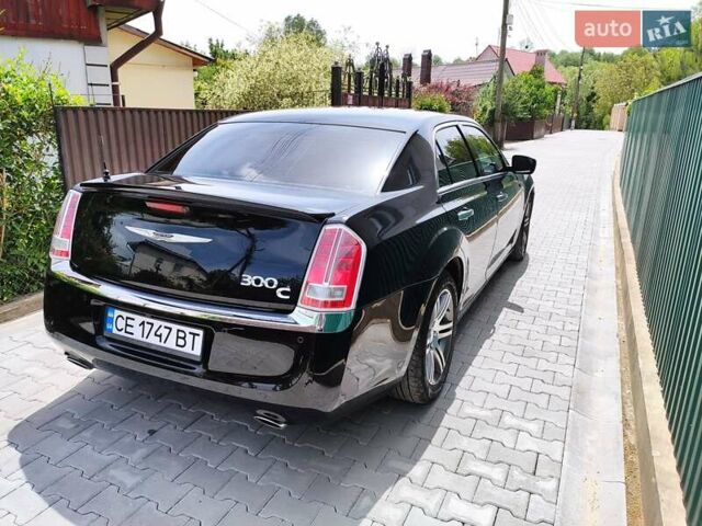 Черный Крайслер 300C, объемом двигателя 3 л и пробегом 259 тыс. км за 13000 $, фото 4 на Automoto.ua