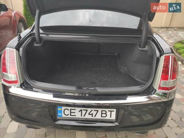 Черный Крайслер 300C, объемом двигателя 3 л и пробегом 259 тыс. км за 13000 $, фото 9 на Automoto.ua