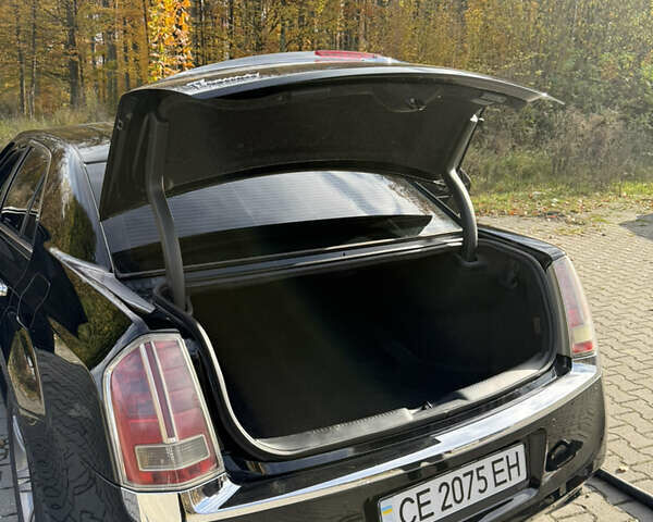 Черный Крайслер 300C, объемом двигателя 3 л и пробегом 280 тыс. км за 13000 $, фото 5 на Automoto.ua