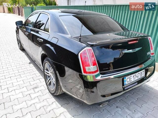 Черный Крайслер 300C, объемом двигателя 3 л и пробегом 259 тыс. км за 13000 $, фото 5 на Automoto.ua
