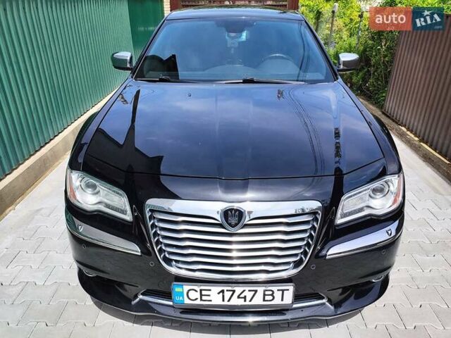 Черный Крайслер 300C, объемом двигателя 3 л и пробегом 259 тыс. км за 13000 $, фото 2 на Automoto.ua