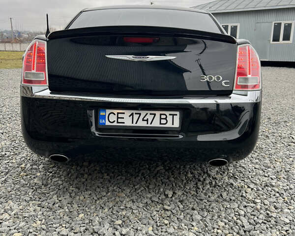 Черный Крайслер 300C, объемом двигателя 2.99 л и пробегом 260 тыс. км за 10800 $, фото 2 на Automoto.ua